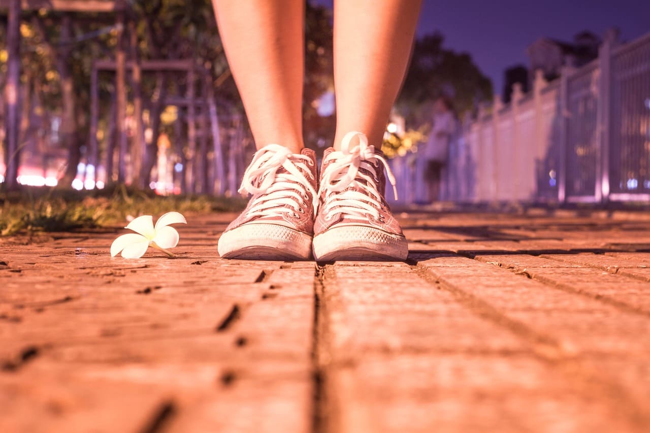 Running shoes on the pavement